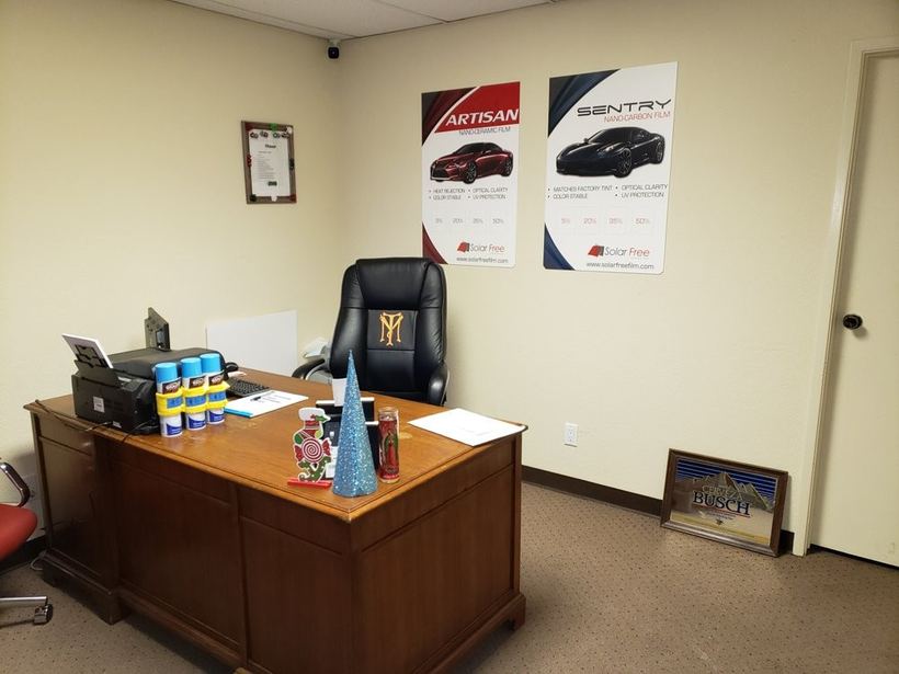 The front office at the shop on Easton Dr, film posters on the wall