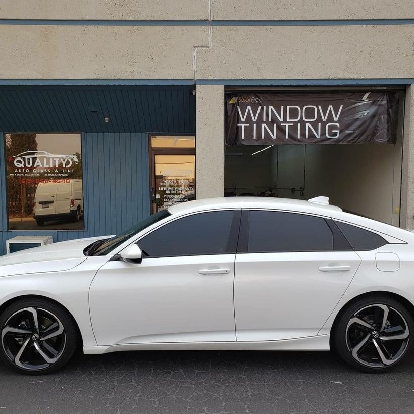 The storefront on Easton Dr with a white Honda Accord after tint